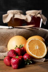 sloik_miodu_z_dodatkami Słoiki miodu z dodatkami owoców truskawek i pomarańczy